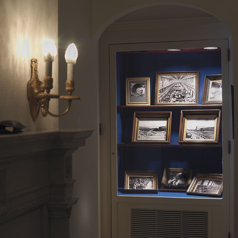Echoes_cabinet with framed photographs
