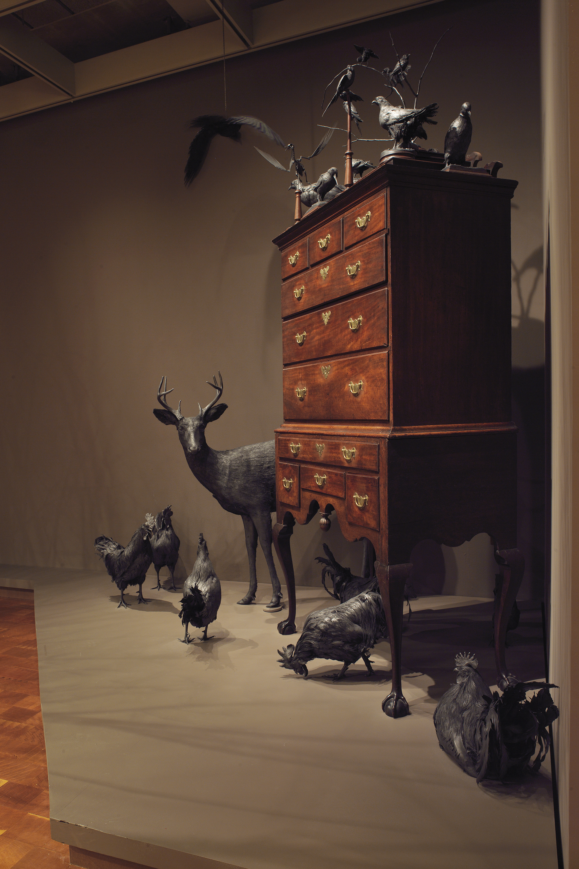 Loca Miraculi_room 1_wood cabinet with deer and birds